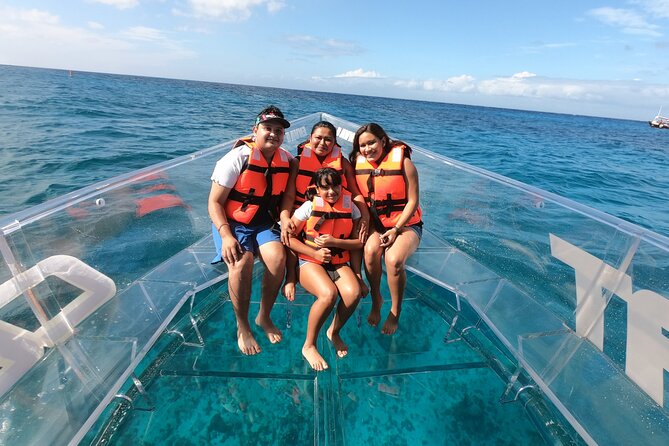 ATV and Clear Boat Ride Full Experience in Cozumel - Clear boat and snorkeling: fish and coral plus sunken-ship remains, with a cash add-on