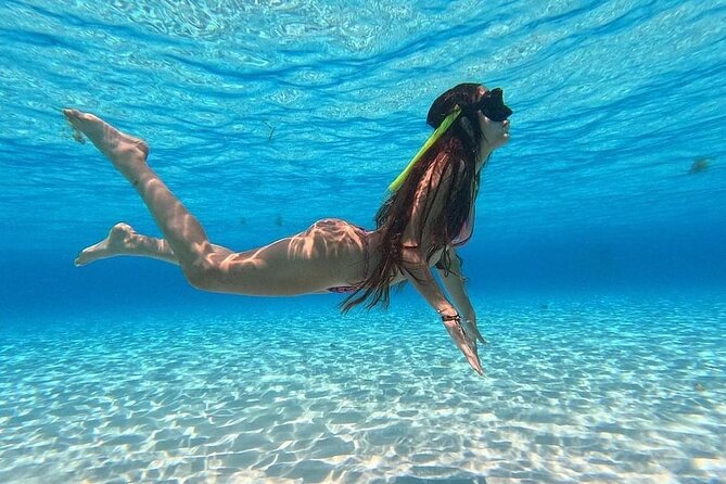 Catamaran in Cozumel with snorkeling at El Cielo and open Bar - El Cielito sandbank (about 1.2 meters): where manta rays enter the story