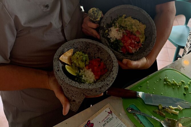 Cocktail Making in Cozumel Mexico - Smashing, seasoning, and winning Best Guac in Show