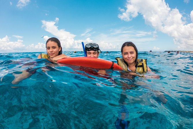 Cozumel Catamaran Snorkeling Tour & lunch - Boat and beach park reality: group size and crowd expectations