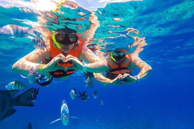 Cozumel Catamaran Tour: Snorkel at Top Reefs & Open Bar - Columbia Reef Snorkeling: Equipment, Guidance, and What to Expect