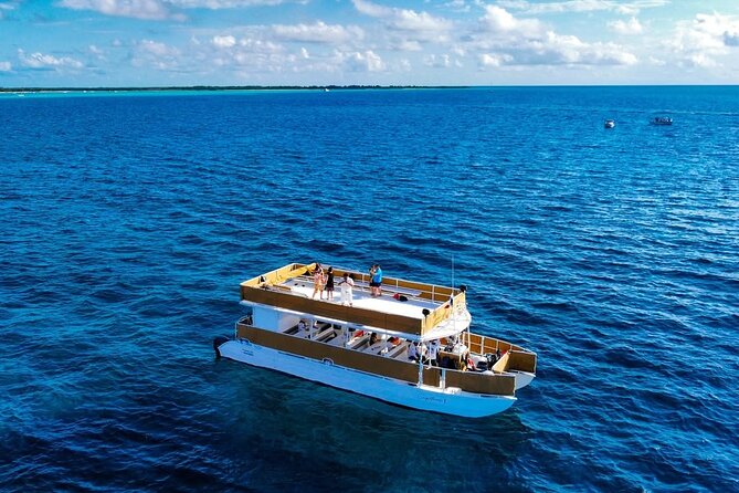 Cozumel Catamaran Tour: Snorkel at Top Reefs & Open Bar - El Cielito Beach Finish: Lunch, Unlimited Drinks for Adults, and a Party Letdown