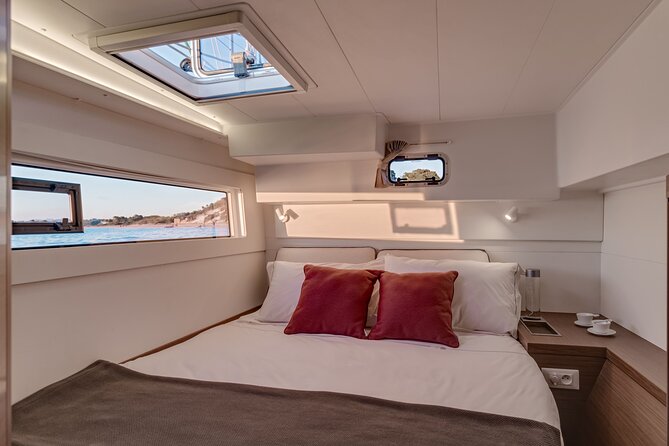 Deluxe Private Boats - 40 ft Catamaran - Playa El Cielo: electric-blue water and a stingray chance