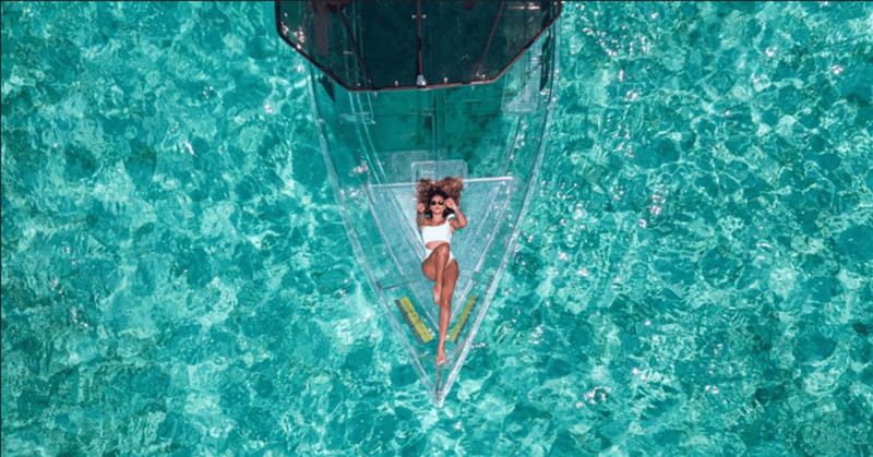 Explore the sea of cozumel in a transprent boat with drinks and snorkel. - Where the tour goes first, and why the north side matters