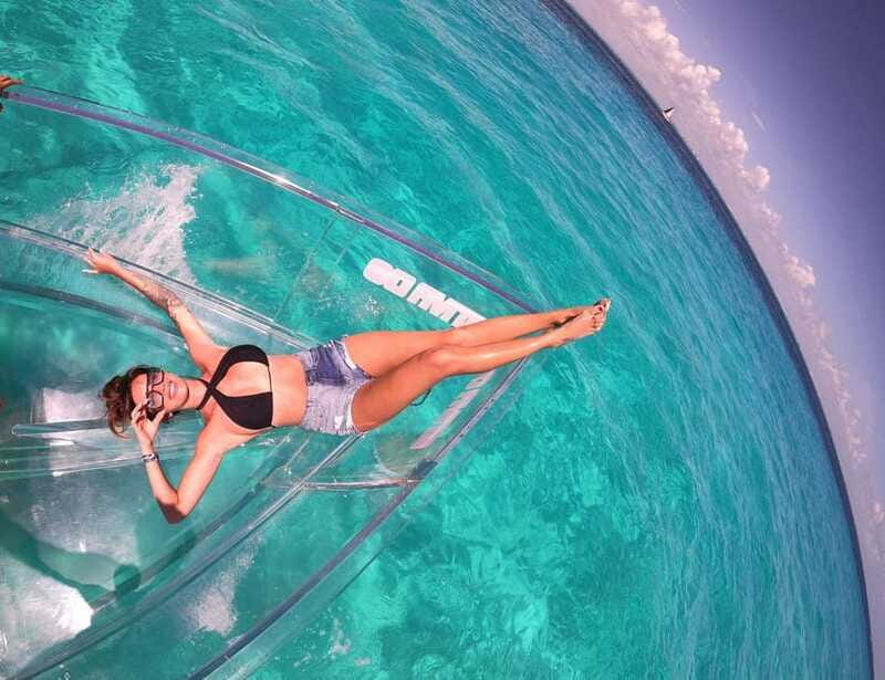 Explore the sea of cozumel in a transprent boat with drinks and snorkel. - Transparent boat viewing: the best part starts before you snorkel
