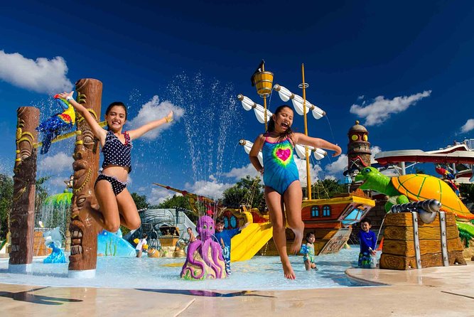 Taste of Mexico: Rolling Cigar & Tequila Experience with transfer - Playa Mia Grand Beach and Water Park, slides, sand, and buffet lunch