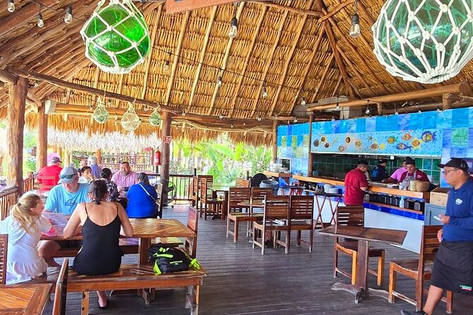 Tastes of Mexico Traditional Food Culture and Beach in Cozumel - Plaza Central and the walk past San Miguel, the clock, and Cozumel letters