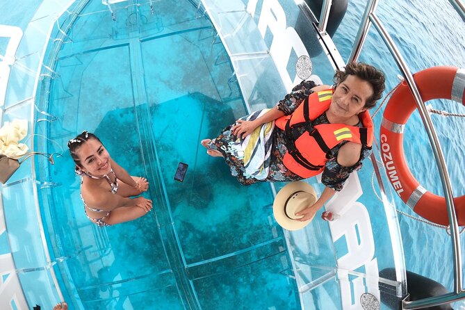 Transparent Boat Ride Around Cozumel Island + Snorkel - Cruising North Cozumel: San Miguel Pier and the Diver Monument